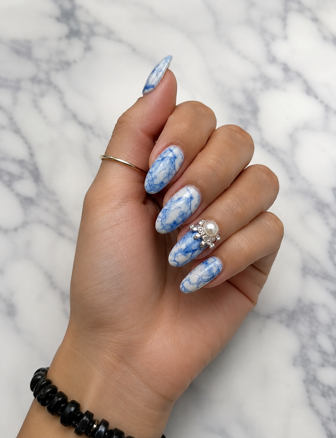 17 Jaw-Dropping Blue Marble Nail Inspirations Guaranteed to Turn Heads! - 10. Elegant Blue Marble with Pearls 1