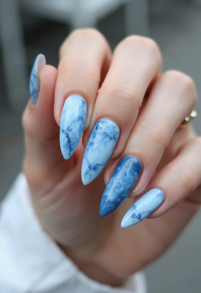 17 Jaw-Dropping Blue Marble Nail Inspirations Guaranteed to Turn Heads! - 16. Light and Dark Blue Marble 1