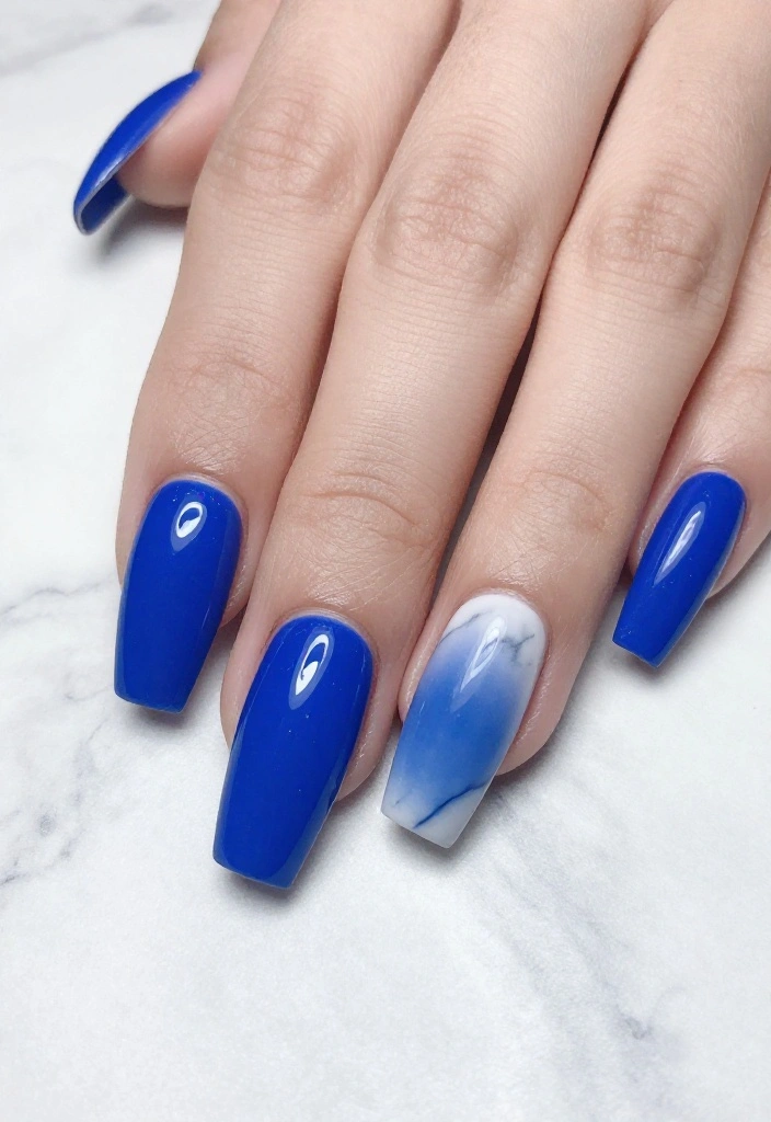 17 Jaw-Dropping Blue Marble Nail Inspirations Guaranteed to Turn Heads! - 7. Royal Blue Ombre Marble 1